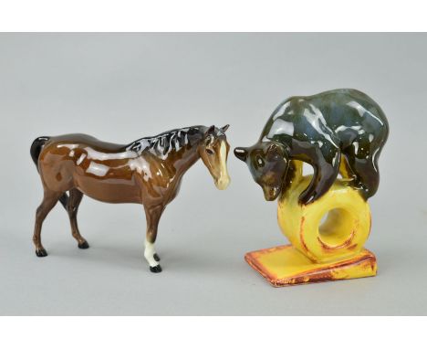 A USSR KONAKOVO CERAMIC STUDY, of bear balanced on wheel, approximate height 15cm together with a Beswick Mare (facing right)