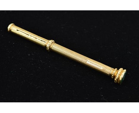 AN EARLY 20TH CENTURY S. MORDAN &amp; CO GOLD RETRACTABLE PENCIL, the cylindrical case with engine turned detail, engraved ac