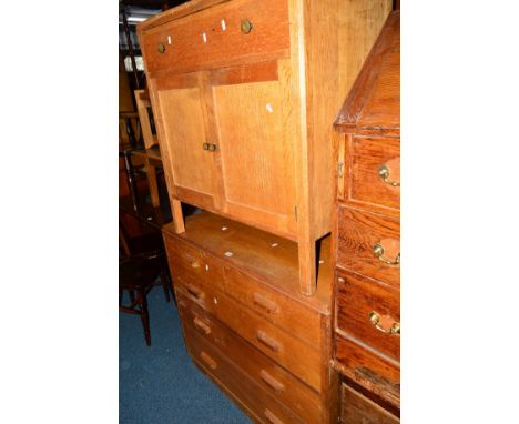 A LIGHT OAK CHEST OF TWO SHORT AND THREE LONG DRAWERS, a stained pine chest of four drawers and an oak two door cupboard with