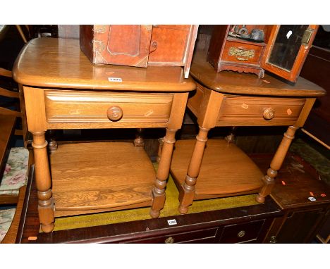 A PAIR OF ERCOL ASH BEDSIDE CABINETS with single drawers