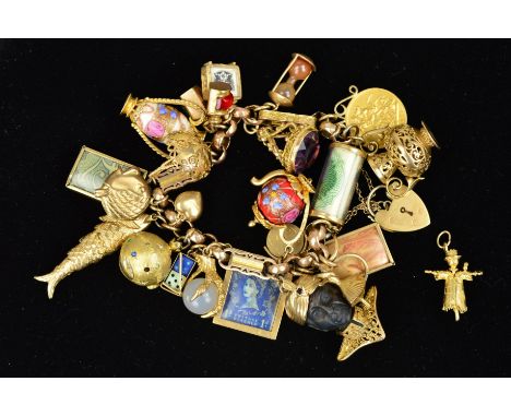A MID 20TH CENTURY 9CT GOLD FANCY LINK CHARM BRACELET, together with twenty three (one loose) assorted charms to include a la