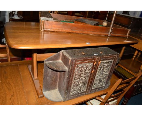 AN ERCOL ASH COFFEE TABLE on a stretchered base, together with an Ercol TV cabinet (2)