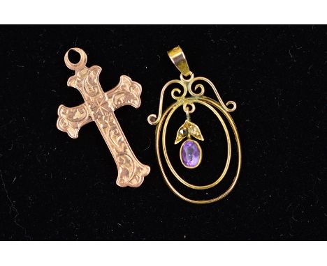 TWO EDWARDIAN 9CT GOLD PENDANTS, the first designed as a cross with engraved foliate decoration, the second a suspended oval 