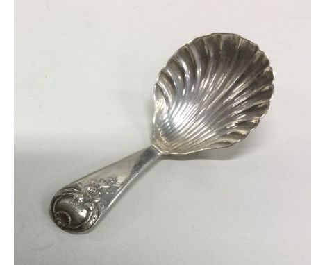 A Georgian silver caddy spoon. London 1802. By John Taylor. Approx. 9 grams. Est. £50 - £80.