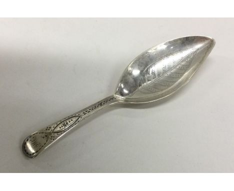 An extremely rare large engraved silver caddy spoon in the form of a leaf. 1811. Approx. 16 grams. Est. £100 - £120.