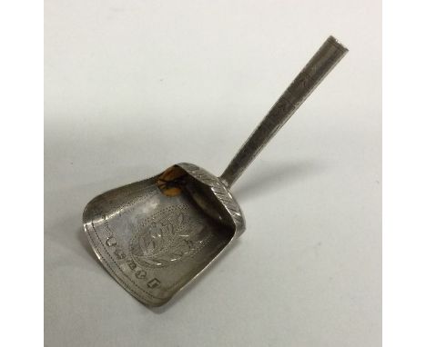 A silver shovel shaped caddy spoon. Birmingham 1815. By John Lawrence.  Approx. 5 grams. Est. £60 - £80.