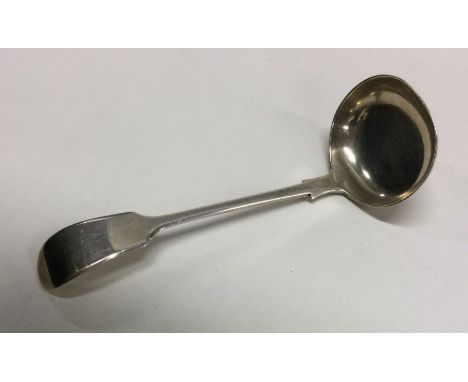 EXETER: A good fiddle pattern silver sauce ladle. By JW&amp;JW. Approx. 33 grams. Est. £30 - £40.