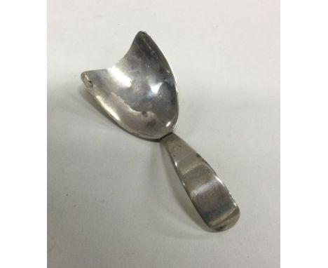 An unusual shaped silver caddy spoon. London 1808. By Samuel Hennell. Approx. 10 grams. Est. £60 - £80.