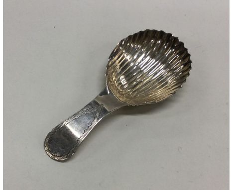 An Antique silver caddy spoon. Marked Sterling with an incuse ‘L’ possibly Australia/New Zealand. Approx. 15 grams. Est. £50 