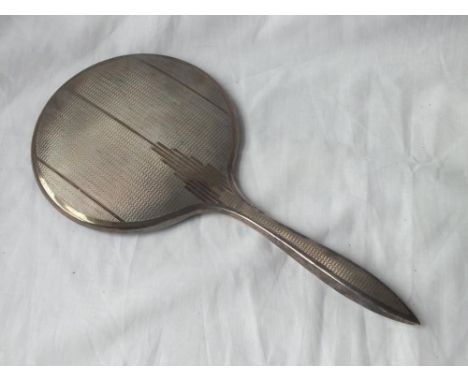 Hand mirror with engine turned decoration 