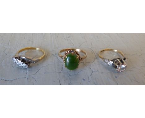 Three stone diamond ring, unmarked, illusion set with graduated brilliant cuts, totalling approx. 0.1 carats, finger size 'K 