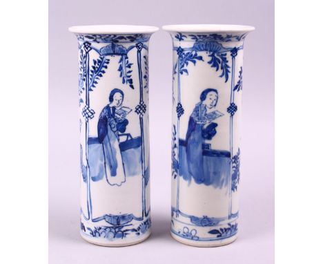 A PAIR OF CHINESE KANGXI BLUE &amp; WHITE PORCELAIN SLEEVE VASES, both decorated with scenes of figures and birds in landscap