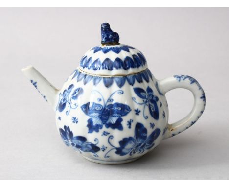 A 19TH CENTURY CHINESE BLUE* WHITE PORCELAIN MOULDED TEA POT &amp; COVER, in the form of a fruit, The moulded body decorated 