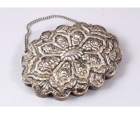 A FINE 19TH CENTURY TURKISH OTTOMAN SILVER MIRROR, with moulded lappet style decoration, 10.5cm high x 14cm wide.