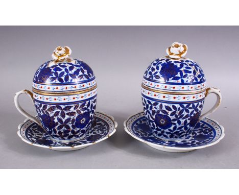 TWO RUSSIAN BLUE &amp; WHITE PORCELAIN CUP, COVER AND SAUCER - FOR ISLAMIC MARKET, decorated with floral decoration, and gilt