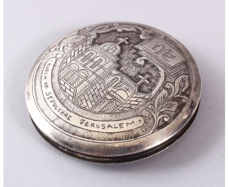 A GOOD 19TH CENTURY JERUSALEM LADIES SILVER POWDER COMPACT, engraved with a village scene and initials, 7.5cm diameter,