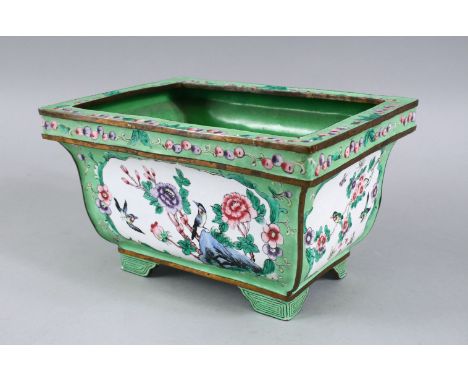 A GOOD 19TH / 20TH CENTURY CHINESE APPLE GREEN ENAMELLED PLANTER, decorated with panels depicting birds and flora, further de