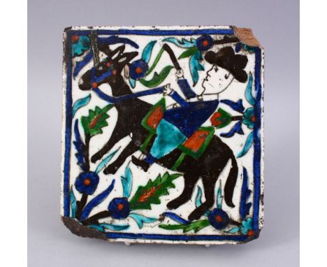AN UNUSUAL PALESTINIAN 'ARMINIAN WORKSHOP' TERRACOTTA TILE, painted with a European man on horseback, 15cm diameter.