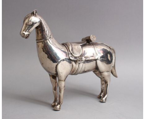 A FINE 19TH CENTURY COLONIAL OR SOUTH AMERICAN SOLID SILVER MODEL OF A HORSE, 26CM WIDE X 22 HIGH