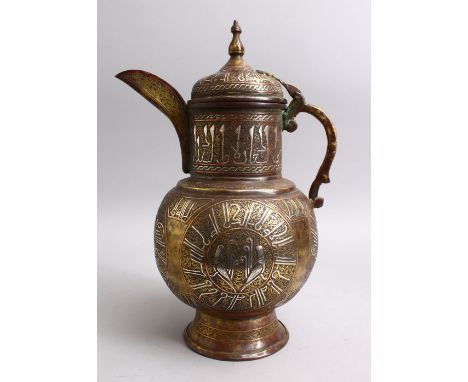 AN ISLAMIC CAIROWARE SILVER INLAID BRASS EWER WITH CALLIGRAPHY DECORATION, 36cm.