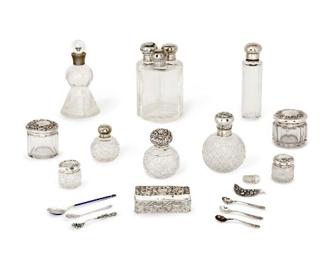 A group of silver mounted vanity items and small silver spoons. Various dates and makers. The group including: a set of three