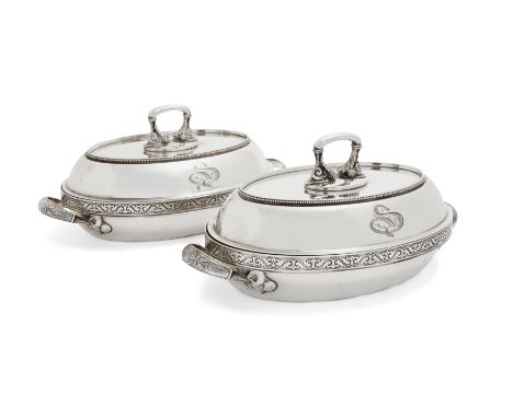 A pair of 19th century American silver entrée dishes. Gorham, Rhode Island, 1872. Of oval form, the twin handles terminating 