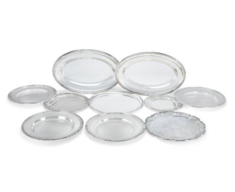 A group of silver plated dishes and trays. The group including: a Mappin & Webb dish, of circular form, reed and cross ribbon