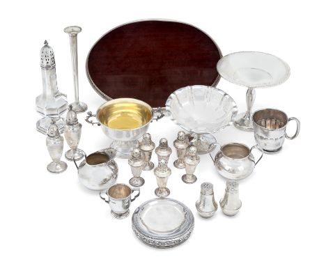 A group of British and American silver. Various dates and makers. The group including: a christening cup, Sheffield, 1934, Vi