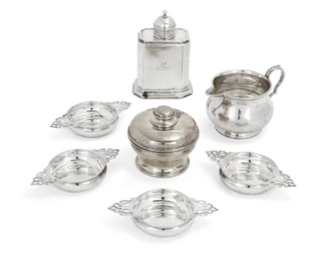 A group of silver items, including a George V silver tea caddy and cream jug. Goldsmiths & Silversmiths Co., London, 1915. Th