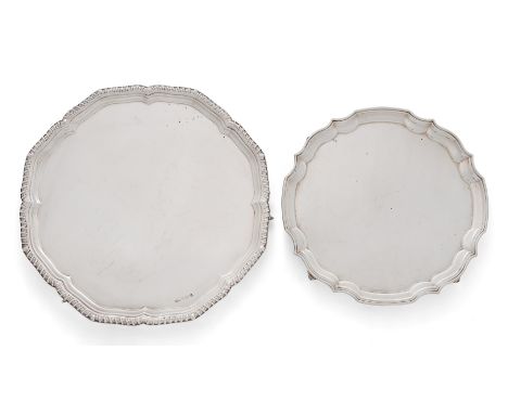 Two Elizabeth II silver salvers. Sheffield and Birmingham, 1964 and 1970.Both of shaped, circular form, the larger example de