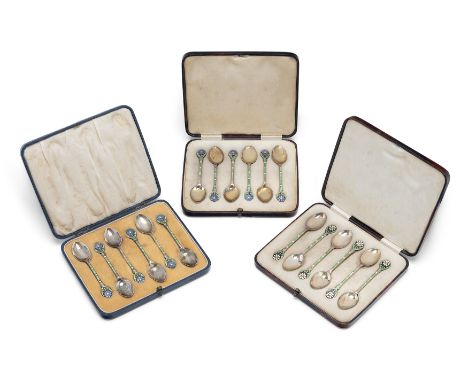 Three cased sets of enamelled silver coffee spoons. Various dates and makers. The group comprising: a set of six spoons, Birm