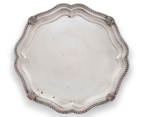 An Italian tray with gadrooned border. Bellotto, stamped Anatriello R&C by Roma. Padua, 20th century.The shaped, circular tra