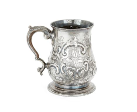 Of maritime interest. A George III silver mug. Lewis Herne & Francis Butty,London, c.1760. Of baluster form, the body chased 