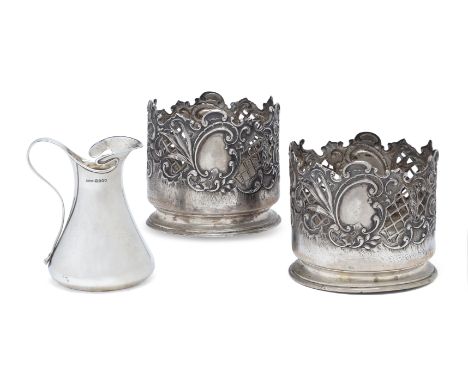 A pair of Austro-Hungarian silver bottle coasters. Franz Rumwolf (active 1899-1924), Vienna, late 19th/early 20th century. De