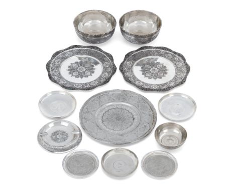 A group of Iranian (Persian) silver including a small plate.Mohammad Taqi Zufan (1894-1979)Isfahan, 20th century.Decorated wi