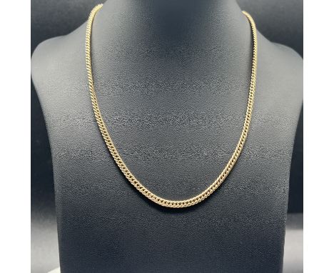 A 9ct vintage gold guards chain,
solid gold chain,
28 inches long,
29.1 grams in weight