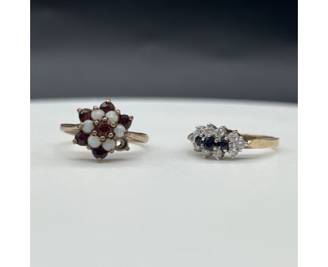 2x 9ct yellow gold dress rings,
cz sapphire ring is a size K,
garnet and opal is a size O,
one garnet missing,
total weight 4