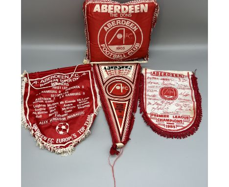 A collection of vintage Aberdeen football collectors items, cushion, flags, pennants