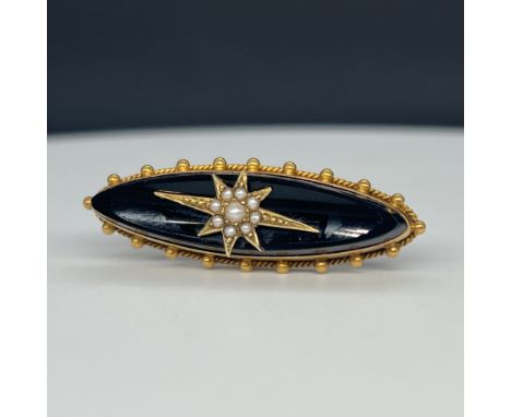 A 9ct yellow Victorian seed pearl mourning brooch, 38mm x 12mm, weight 6.3grams