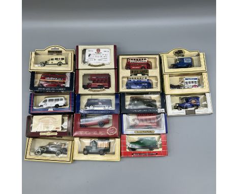 A bus gift set, Dennis fire engine model, London bus and other collectors models