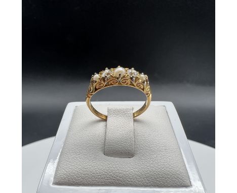 An 18ct yellow gold Victorian seed pearl and diamond ring, size J, weight is 2.7 grams