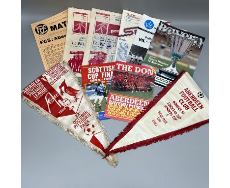 A mixed lot of vintage Aberdeen football memorabilia, badges, programmes