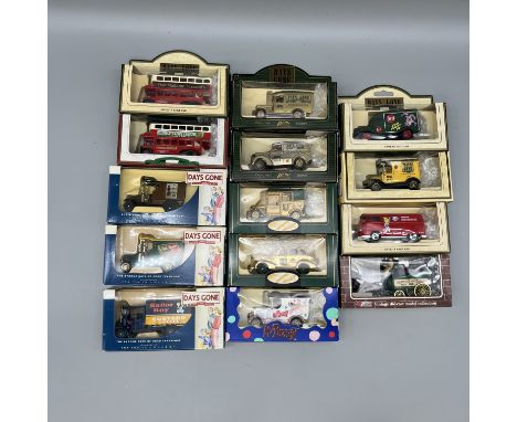A collection of die cast vintage cars and vans