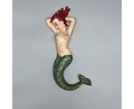 A vintage alloy mermaid