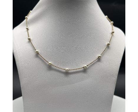 An antique 9ct yellow gold cultured pearl necklace.
unhallmarked,
16 inches long,
2.7 grams in weight