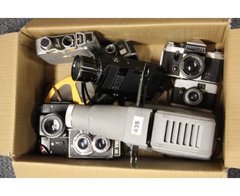 Three cameras, two cine cameras and a Gnome projector.