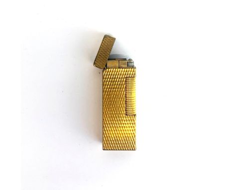 A Dunhill gold plated lighter, H. 6cm.