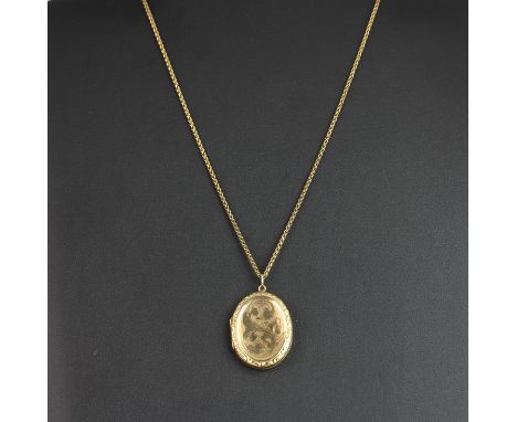 A 9ct yellow gold (stamped 375) portrait pendant and chain, L. 4cm.