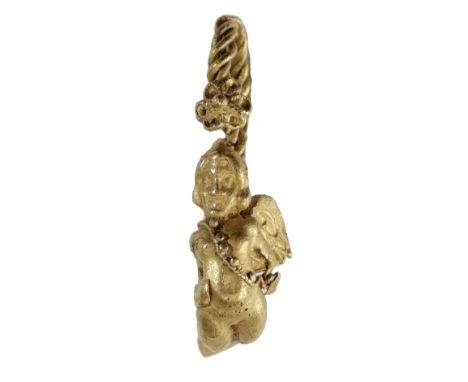 Hellenistic, 3rd-2nd century BC, a gold earring decorated with a winged Eros, hands on hips and a beaded sash across his ches