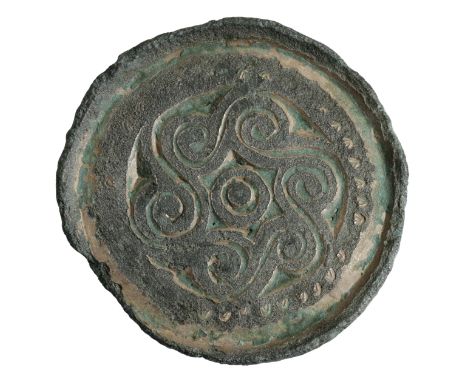 Anglo-Saxon, 6th century, a gilt bronze saucer brooch, measuring 39mm in diameter, 25.97g, with a flared rim, chip carved des
